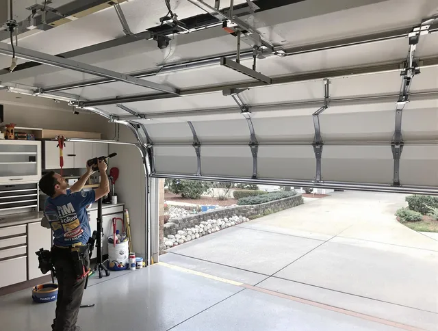 Garage door track repair service by Watertown Garage Door Repair in Watertown